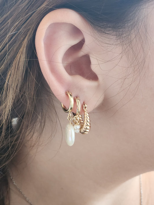 Pearl earrings set in gold