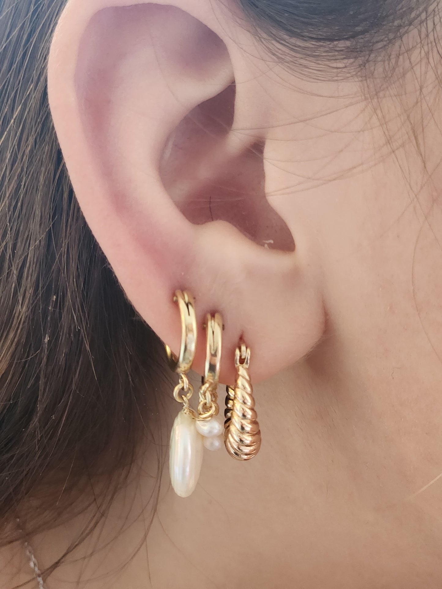 Pearl earrings set in gold